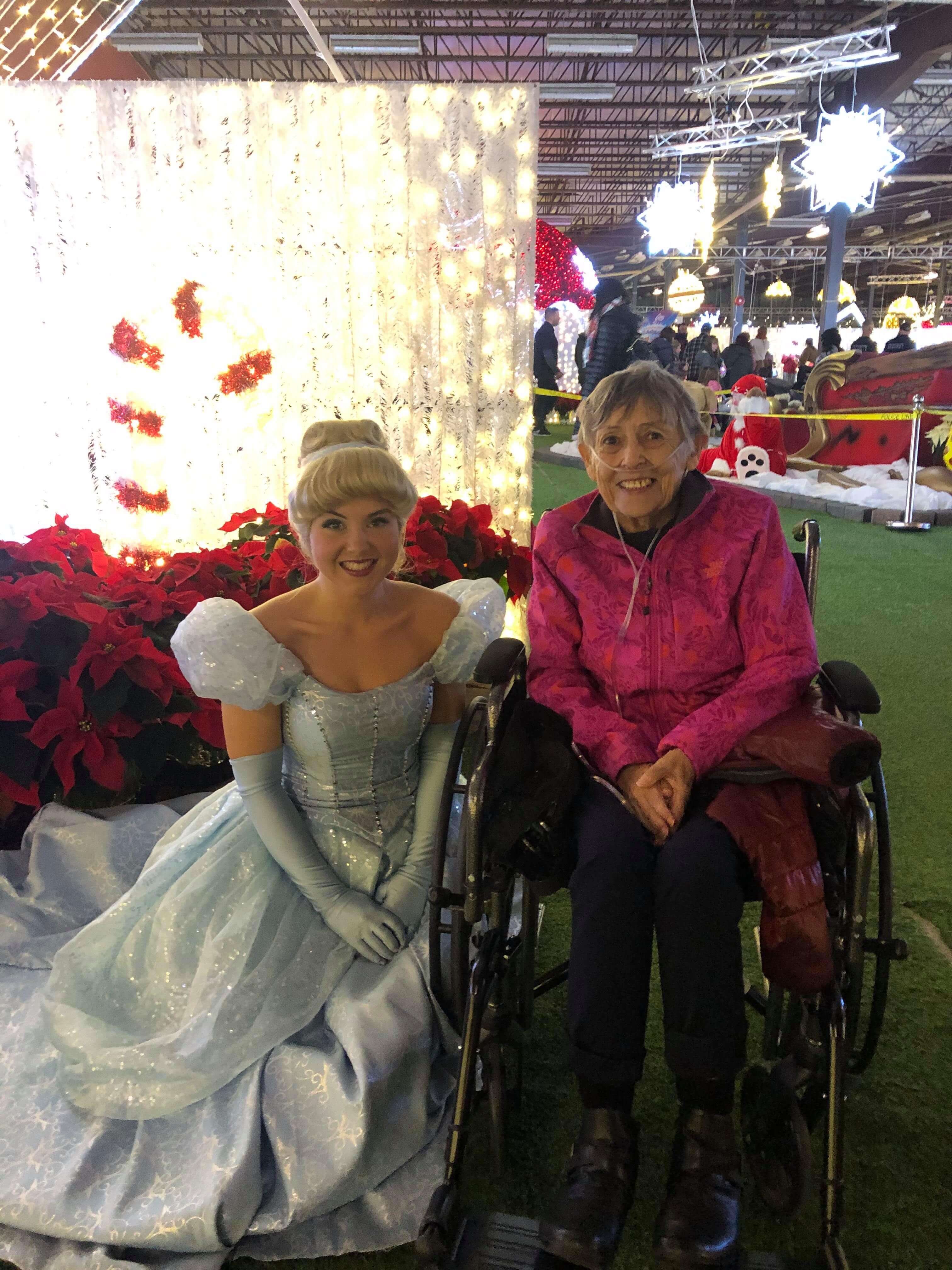 Sally smiling with Cinderella at Glow Park