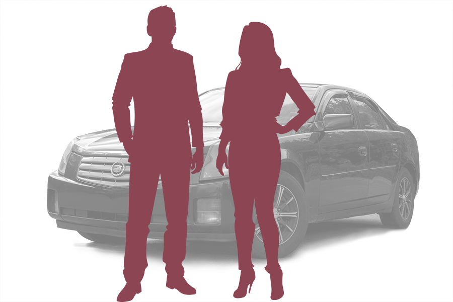 two people cutouts in front of vehicle